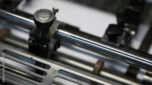 Details and mechanisms of the printing machine in motion