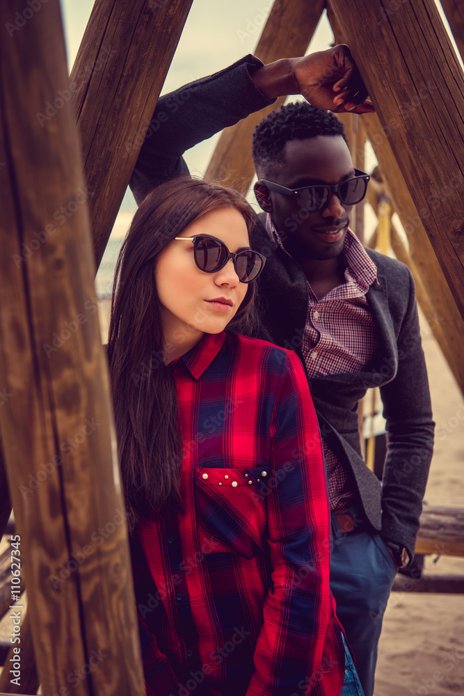 Portrait of afro american guy with caucasian female.
