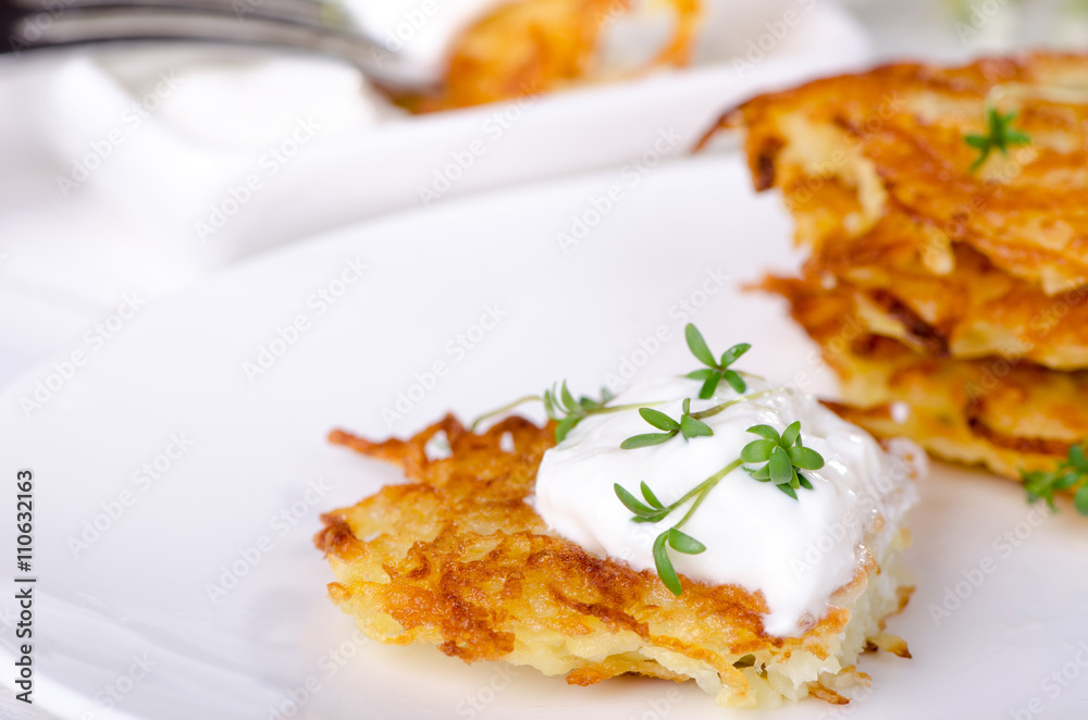 Potato pancakes with sour cream sauce