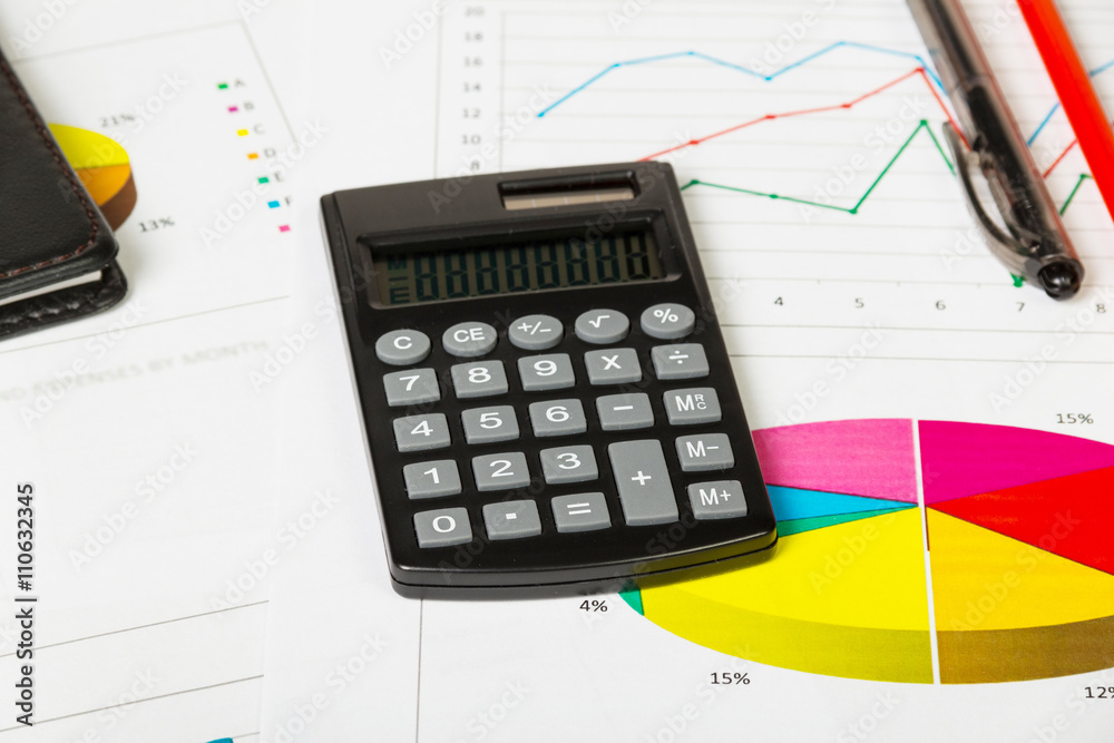 Financial documents and calculator on the table