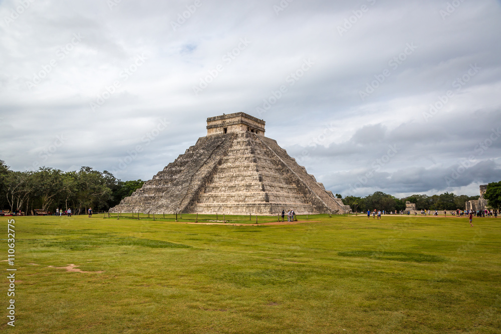 Chichen Itza, Mexico - January 12th 2014 - Local and tourists enjoying a cloudy morning in Chichen Itza near by Cancun in Mexico Chichen Itza, Mexico - January 12th 2014 - Local and tourists enjoying a cloudy morning in Chichen Itza near by Cancun in Mexico