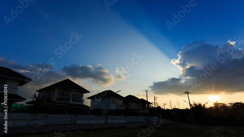 silhouette house of village suburb with beautiful sky background