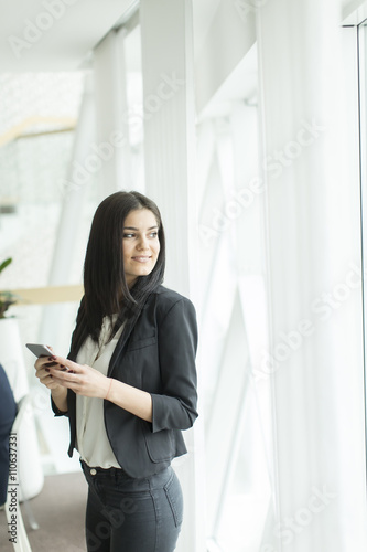 Woman with a phone Free Download Woman with a phone - GFXLoad