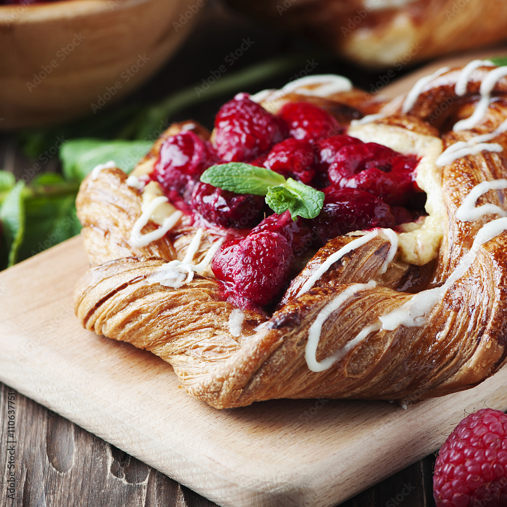 Sweet homemade cake with fresh berry and mint