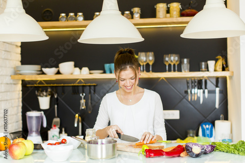 Young woman in the kitchen