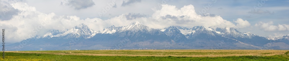Fototapeta premium panoramic view of high mountains in clouds in Slovakia