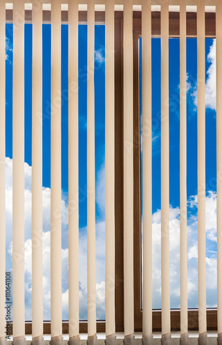 window blinds cloud sky