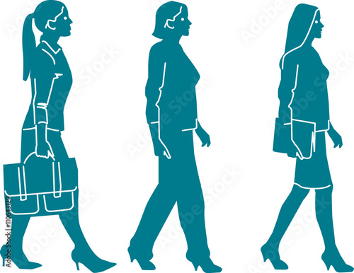 three businesswomen walking in a row