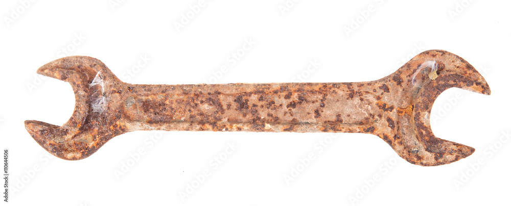 old rusty spanner isolated on white background