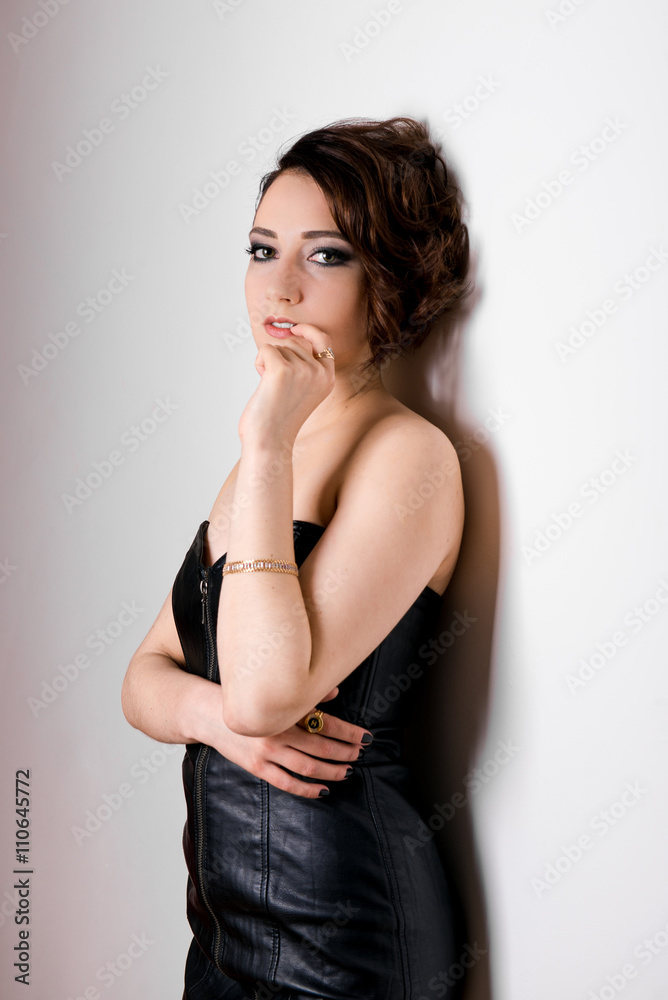 Beautiful young woman looking size in thoughtful and dreaming - white background. Portrait of a beautiful young woman
