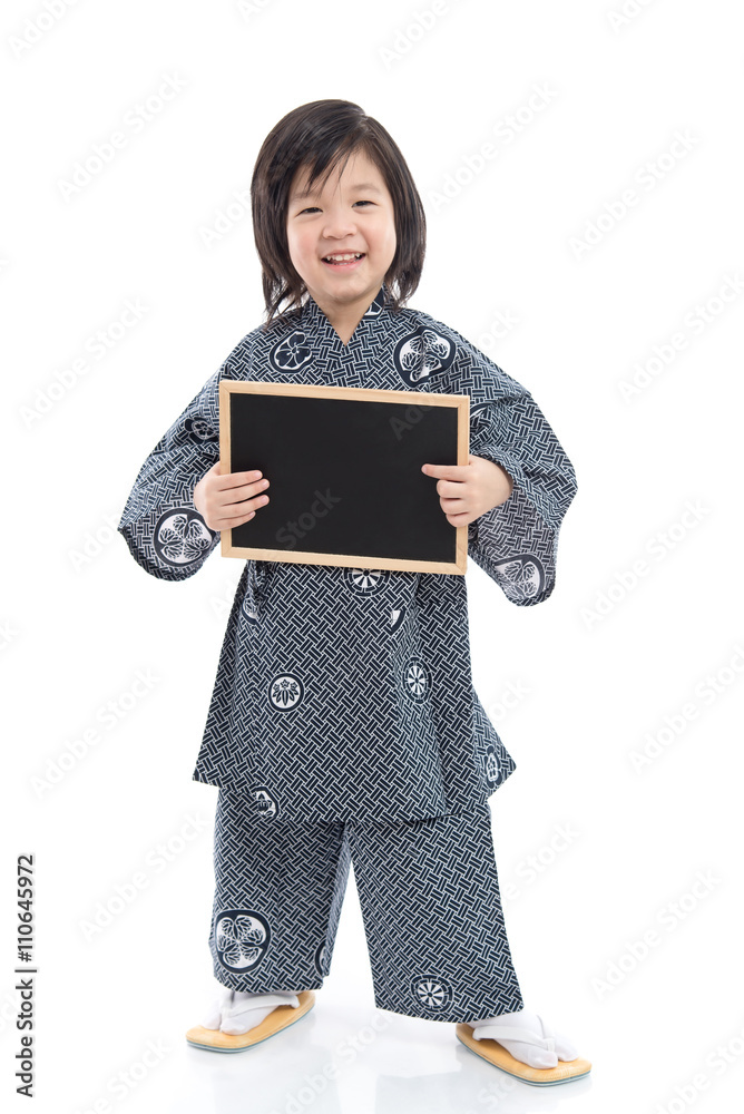 Cute asian boy holding black board on white background Cute asian boy holding black board on white background