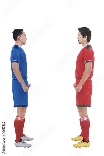 Two football player facing each other