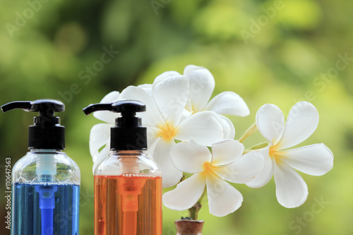 Body care product shower shampoo lotion and Frangipani or plumer