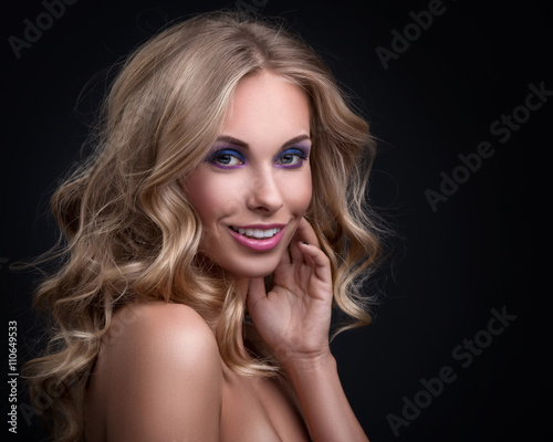 Blonde woman with curly hair
