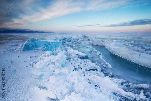 large ice cubes around a crack at Baikal © jenj_irk