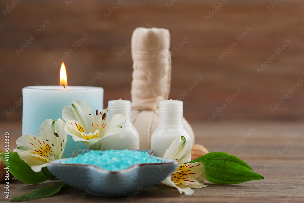 Spa still life in light blue color on wooden background