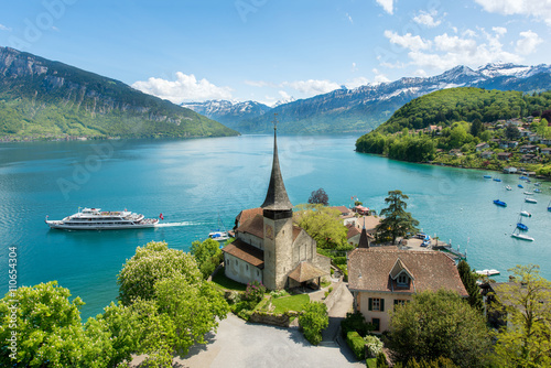 Spiez castle with cruise ship on lake Thun in Bern, Switzerland