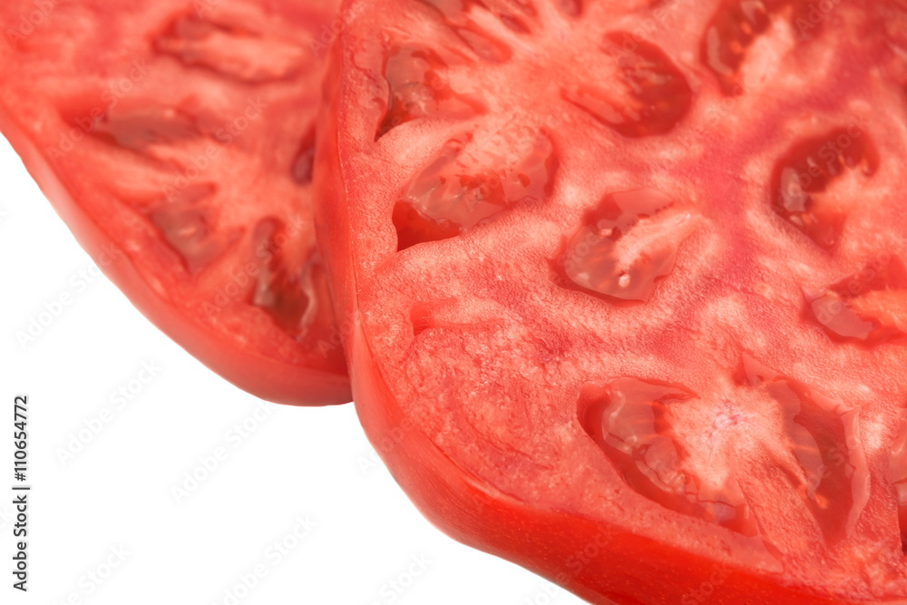 Two Sliced Tomato Closeup Isolated On White Background Two Sliced Tomato Closeup Isolated On White Background