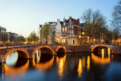 Wonderful view on houses of Amsterdam in night, Netherlands