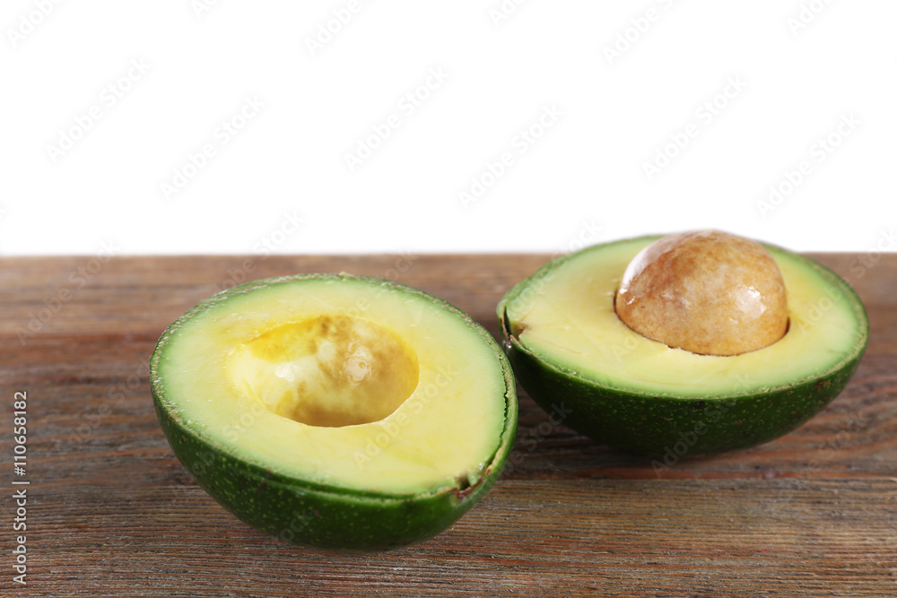 Fresh avocado on wooden table
