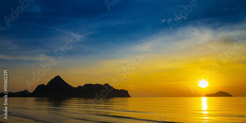 Natural scene at Ao Manow beach in sunrise time. Process color. photo