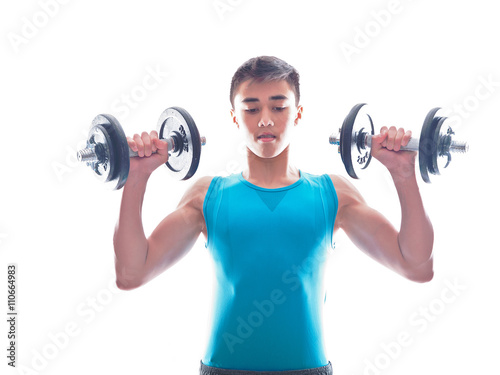 teenage boy during muscle building exercise