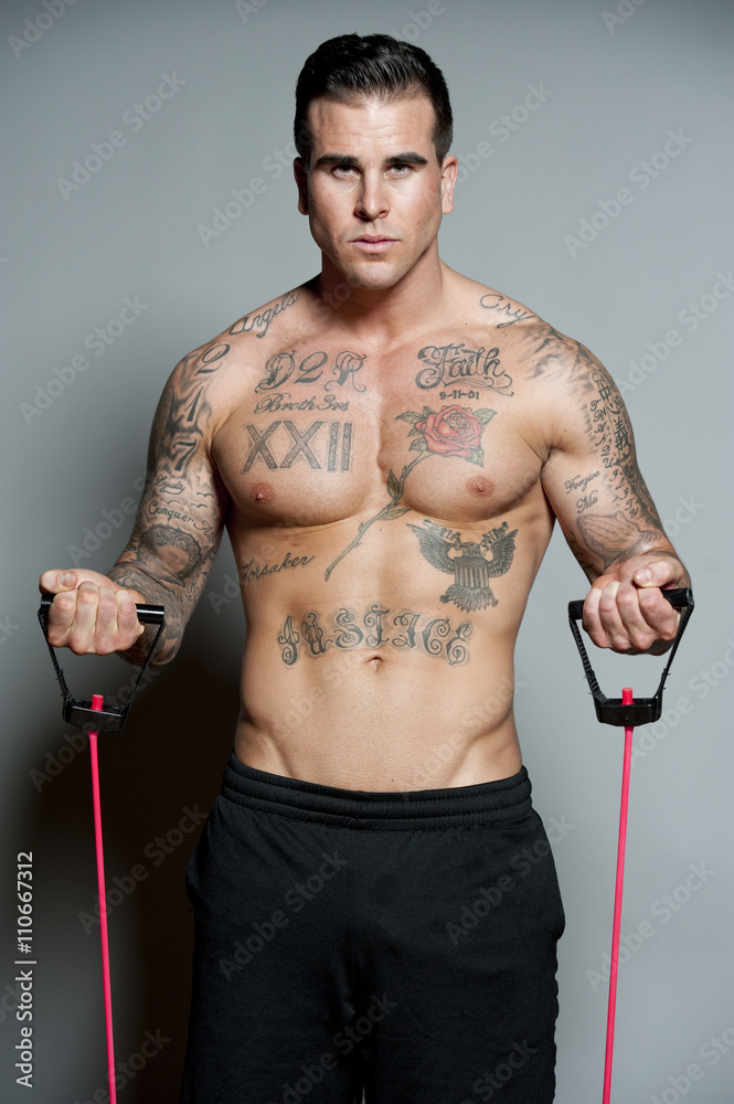 Male Body Builder Doing Curls