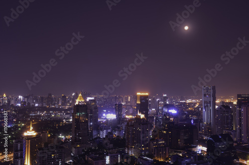 urban cityscape night view and moon light © bank215