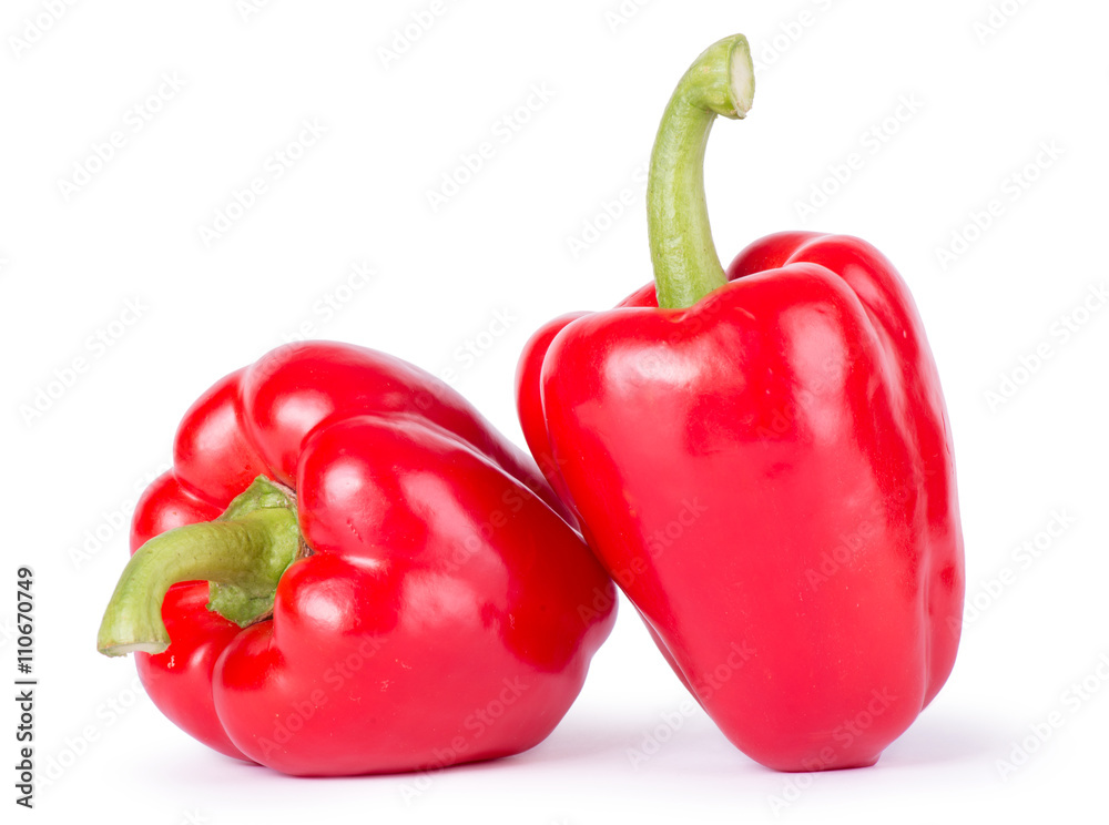 Two ripe peppers on a white background Two ripe peppers on a white background