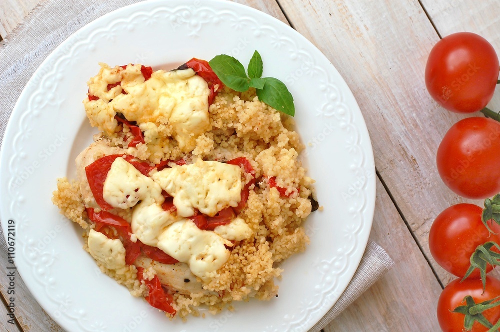Chicken fillet withe potatoes, cheese, basil and couscous