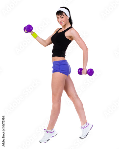 Healthy woman with dumbbells working out
