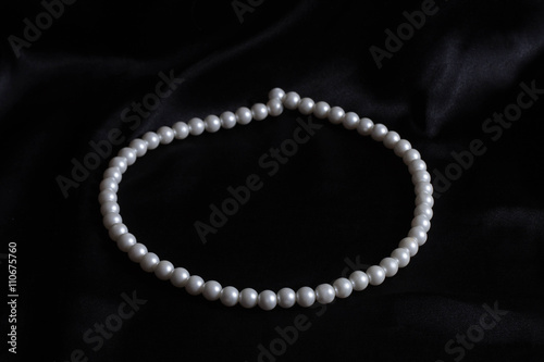 jewelry pearl necklace on black backgrounds
