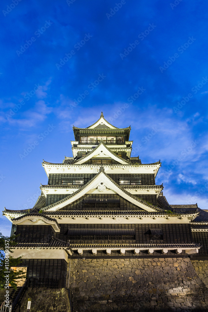 Kumamoto Castle at night in Kumamoto, Kyushu, Japan