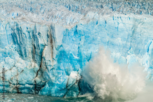Splash after iceberg fall at Perito Moreno glacier in Patagonia, Argentina