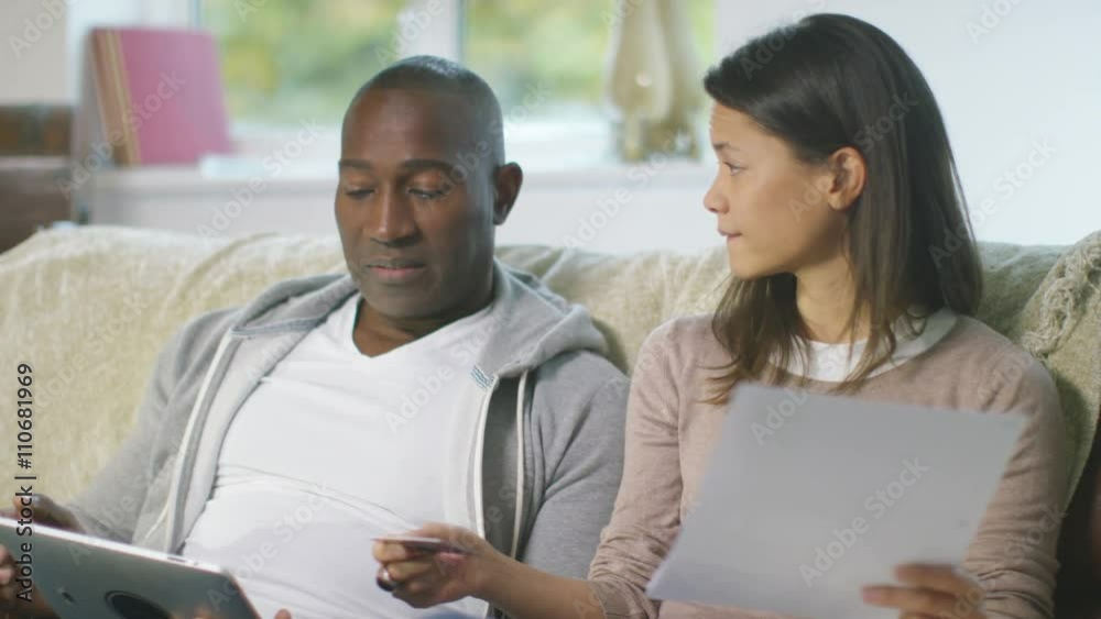  Couple with financial problems doing household accounts