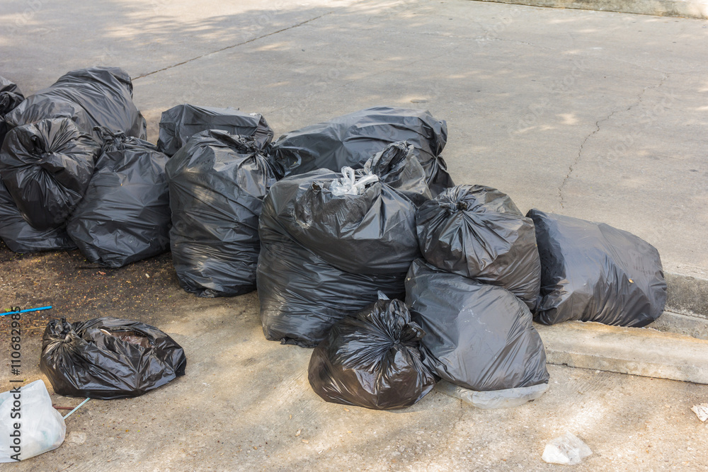 Plastic trash bags on outside street office Plastic trash bags on outside street office
