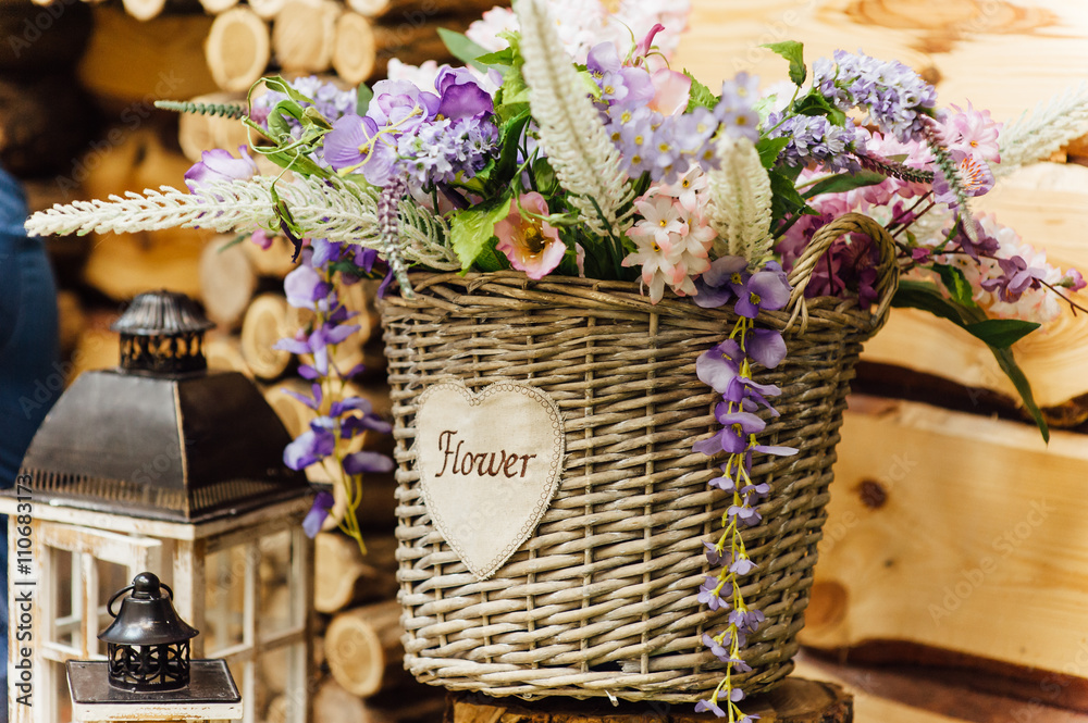 beautiful bouquet of bright flowers in basket