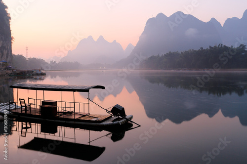 Sunrise at Li River, Xingping, Guilin, China. Xingping is a town in North Guangxi, China. It is 27 kilometers upstream from Yangshuo on the Li River photo