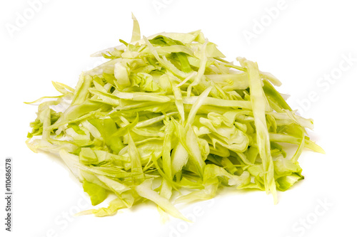 Hill chopped cabbage isolated on white background