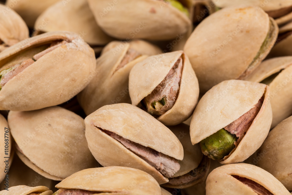 Pistachio nuts arranges as background Pistachio nuts arranges as background