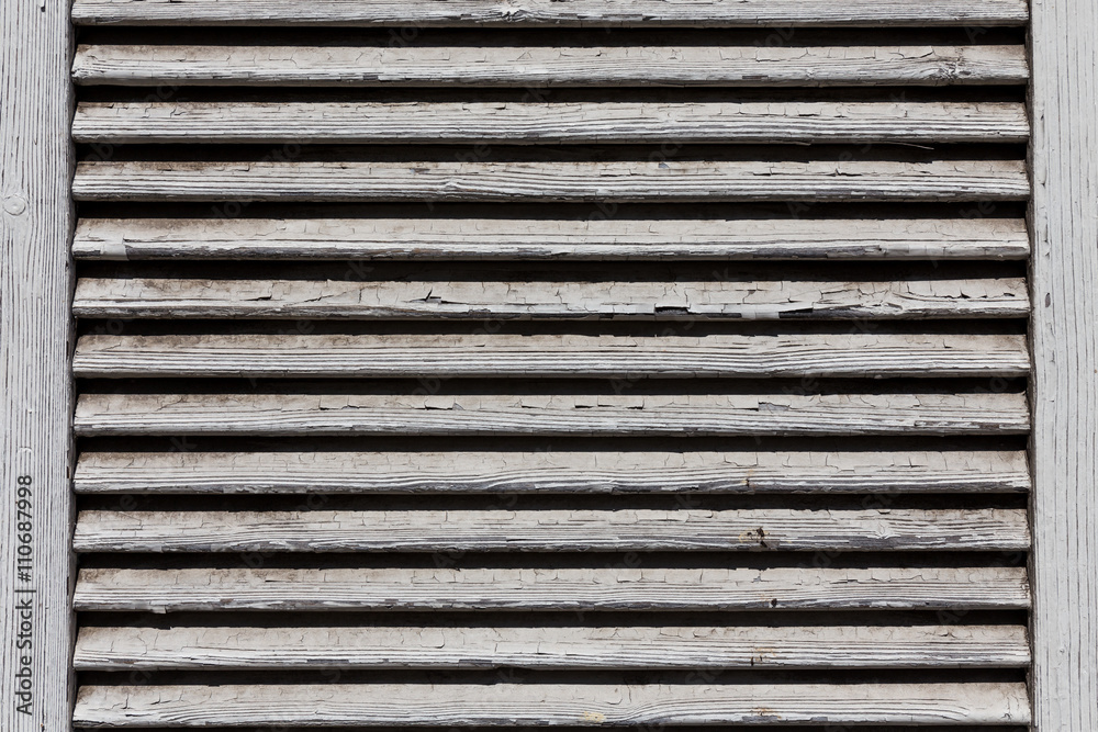 wooden shutters, covering a window or door