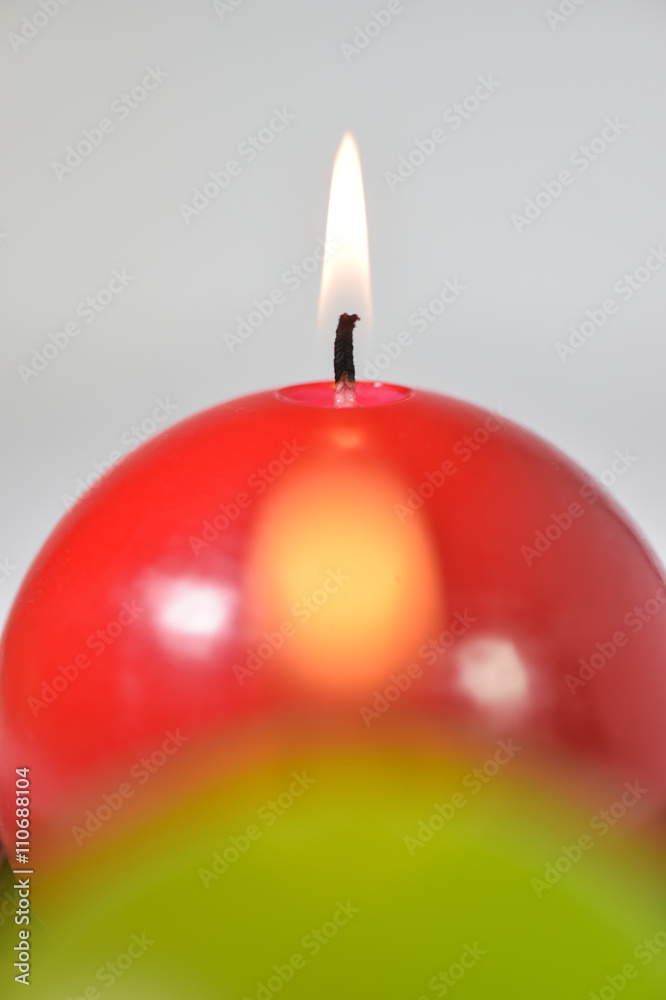 Burning candles green and red