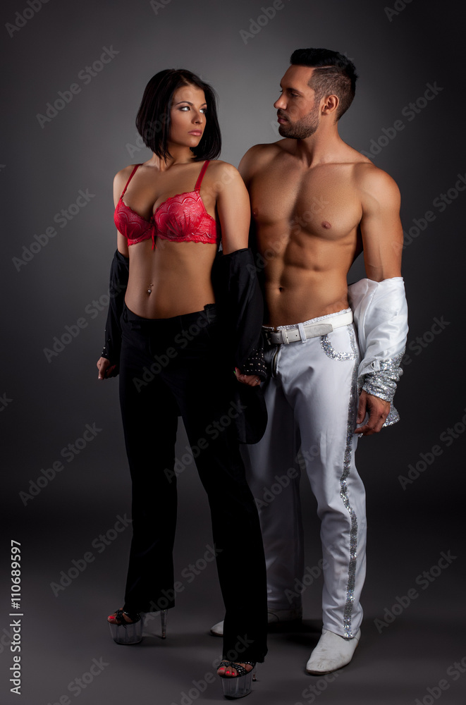 Striptease show. Sexy couple posing in studio Stock Photo | Adobe Stock