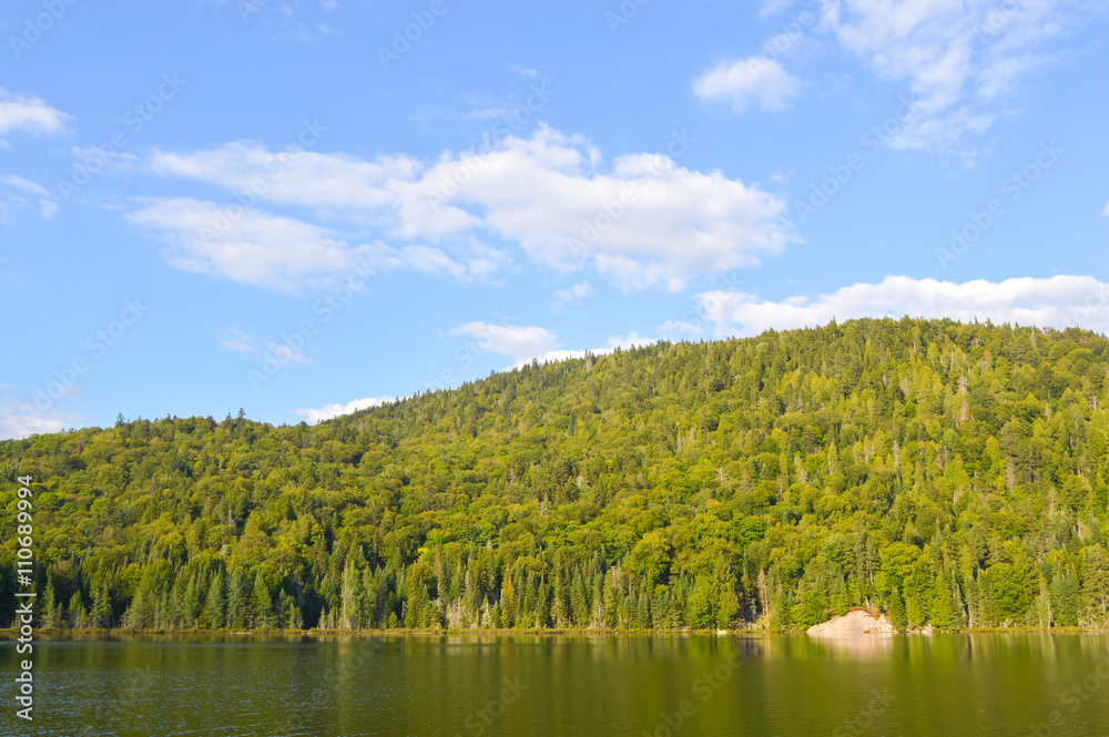 Lac in Mont-Tremblant national park in sunshine, Quebec, Canada