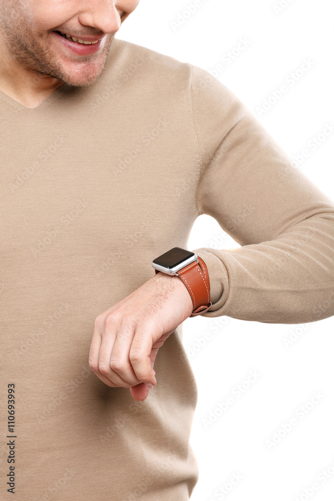 Fototapeta premium Cheerful guy is checking time
