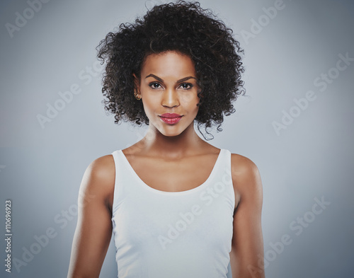 Centered front view of pretty grinning woman