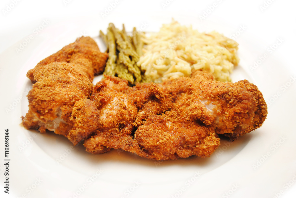 Homemade Baked Chicken Tenders Served as a Side Dish Homemade Baked Chicken Tenders Served as a Side Dish
