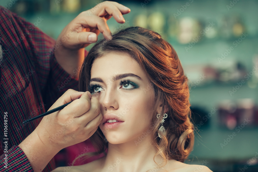 Fototapeta premium Young woman with beautiful makeup