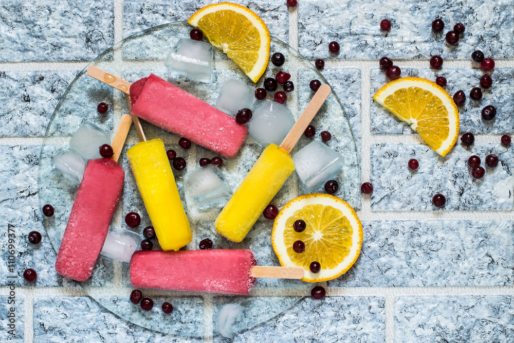 Delicious fruit ice with orange and cranberries