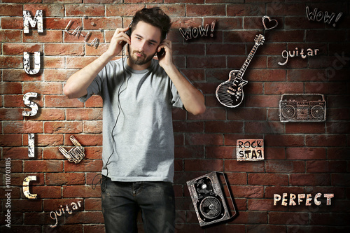 Young man with headphones l...